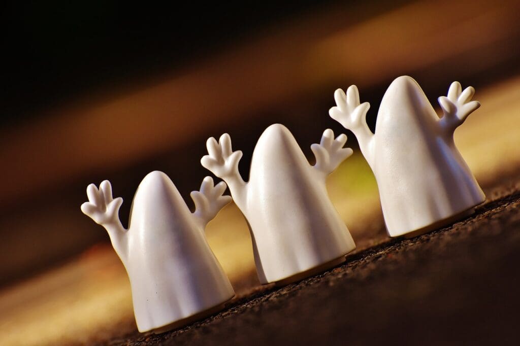 Ghost-style poker image of three toy ghosts
